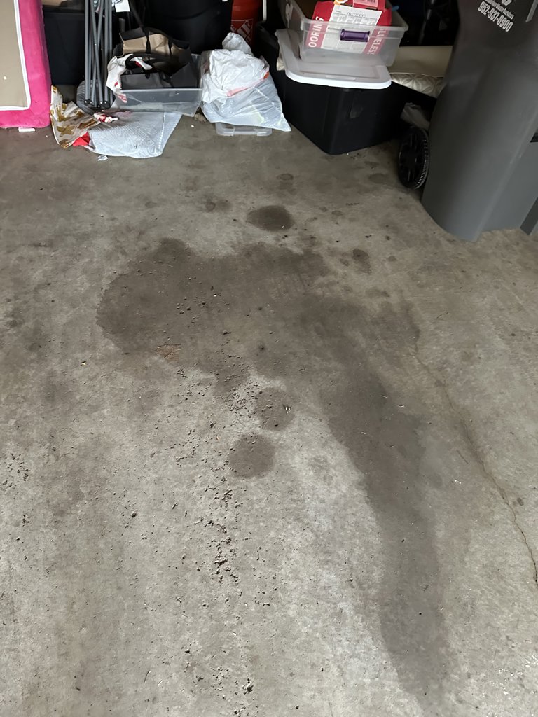 Two car garage concrete floor repair or replacement.
