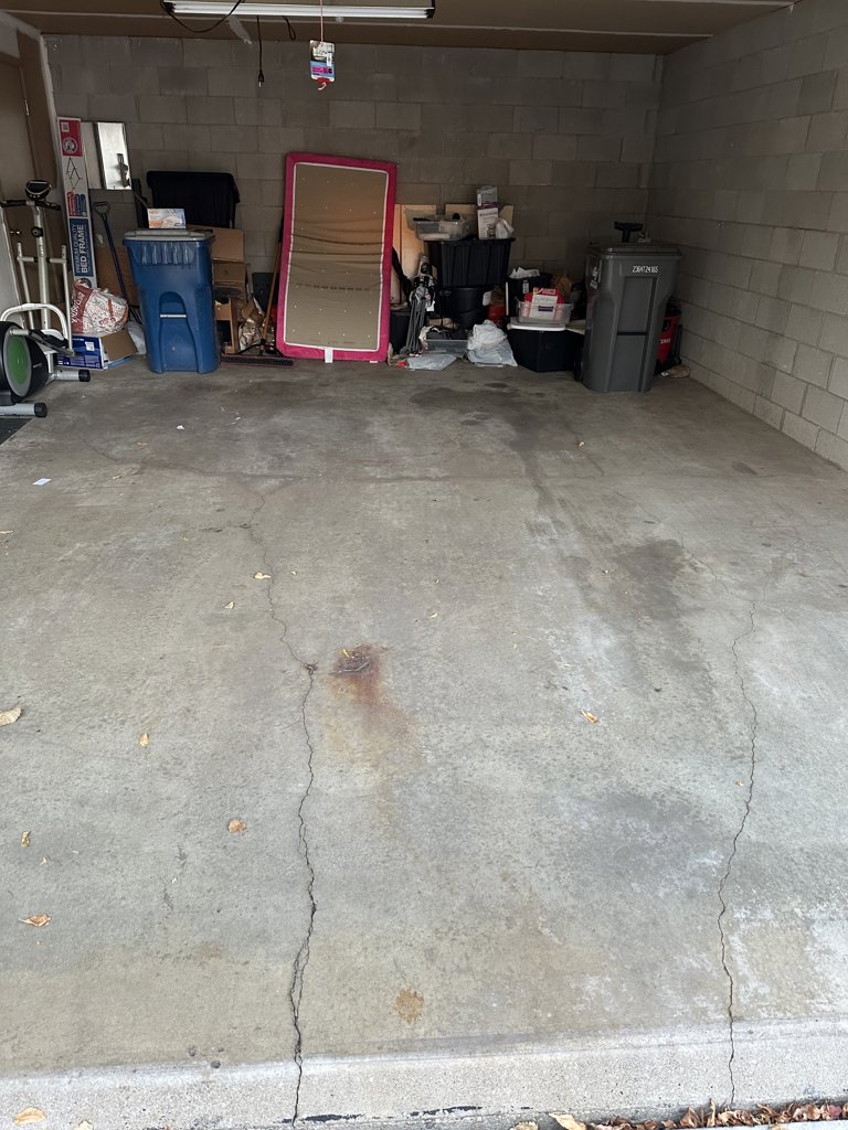 Two car garage concrete floor repair or replacement.