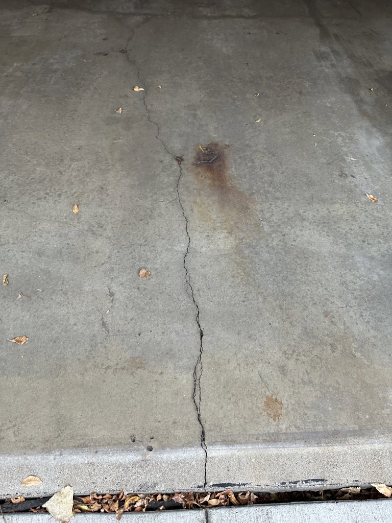 Two car garage concrete floor repair or replacement.